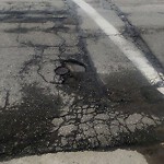 Pothole at 102 Cypress St