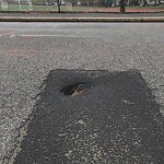 Pothole at 57 59 Highland Rd