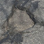 Pothole at 100–198 Sumner Rd