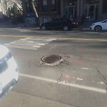 Pothole at 395 397 Harvard St